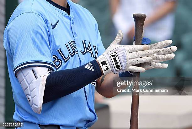 Detailed view of the Franklin batting gloves worn by Nathan Lukes of the Toronto Blue Jays as he waits on-deck to bat prior to the start of the game...