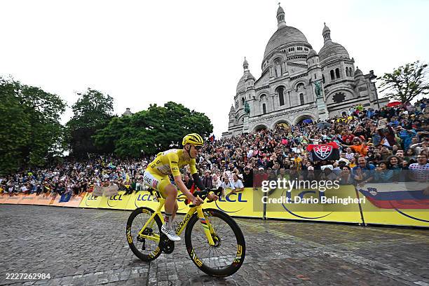 Tadej Pogacar of Slovenia and UAE Team Emirates - XRG - Yellow leader jersey passing the Cote de la Butte Montmatre close the Basilique du...