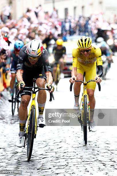 Wout Van Aert of Belgium and Team Visma | Lease a Bike and Tadej Pogacar of Slovenia and UAE Team Emirates - XRG - Yellow leader jersey compete in...