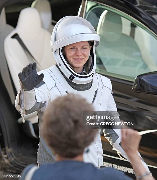 Crew-11 member NASA astronaut and mission commander Zena Cardman waves to family and supporters as she departs the Neil A. Armstrong Operations and...