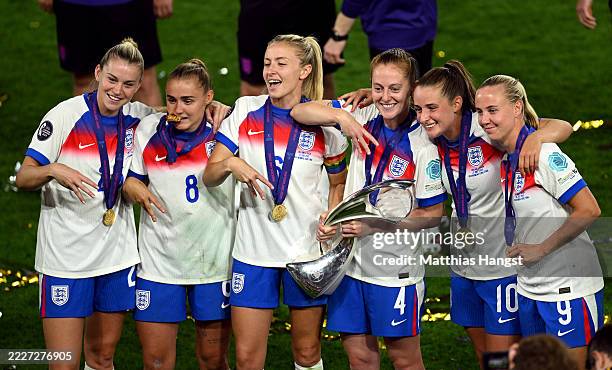 Alessia Russo, Georgia Stanway, Leah Williamson, Keira Walsh, Ella Toone and Beth Mead of England pose for a photograph with the UEFA Women's EURO...