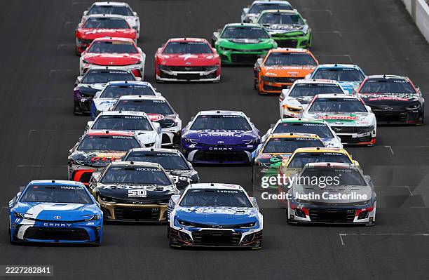 Denny Hamlin, driver of the Progressive Toyota, Kyle Larson, driver of the HendrickCars.com Chevrolet, and William Byron, driver of the Liberty...