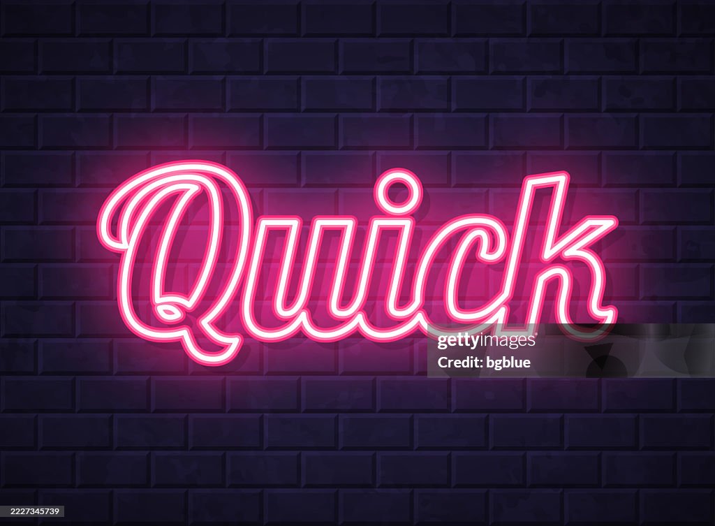 Quick - Glowing neon text on brick wall background