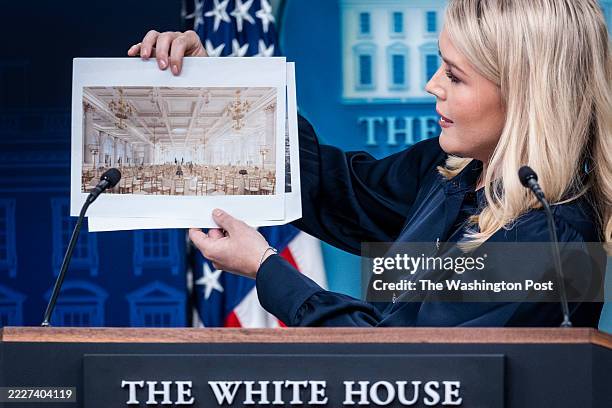 Washington, DC White House Press Secretary Karoline Leavitt holds up renderings of the proposed White House Ballroom during a press briefing at the...