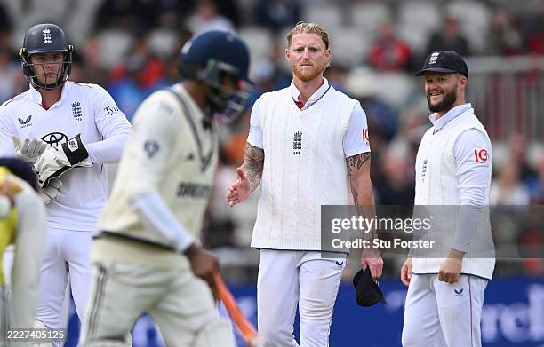 England captain Ben Stokes goes to shake hands with India batsman Ravindra Jadeja with 15m overs of the day remaining as Jamie Smith and Ben Duckett...