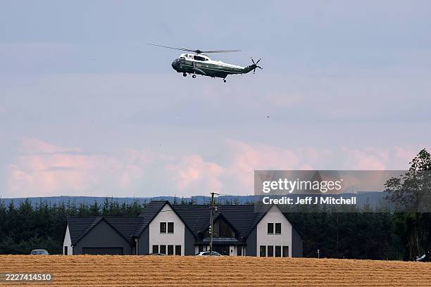 Marine One carrying President Trump and Prime minister Keir Starmer arrives at his golf course at Balmedie on July 28, 2025 in Aberdeen, Scotland....