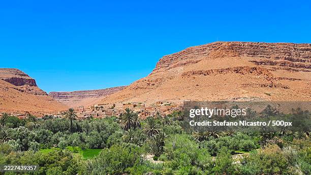 scenic view of mountains against clear blue sky,midelt,morocco - midelt photos et images de collection