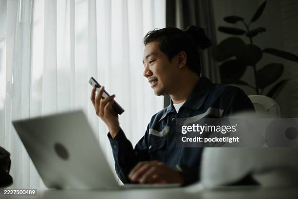 technician engineer using ai voice assistant while working. - computer chat window stock pictures, royalty-free photos & images