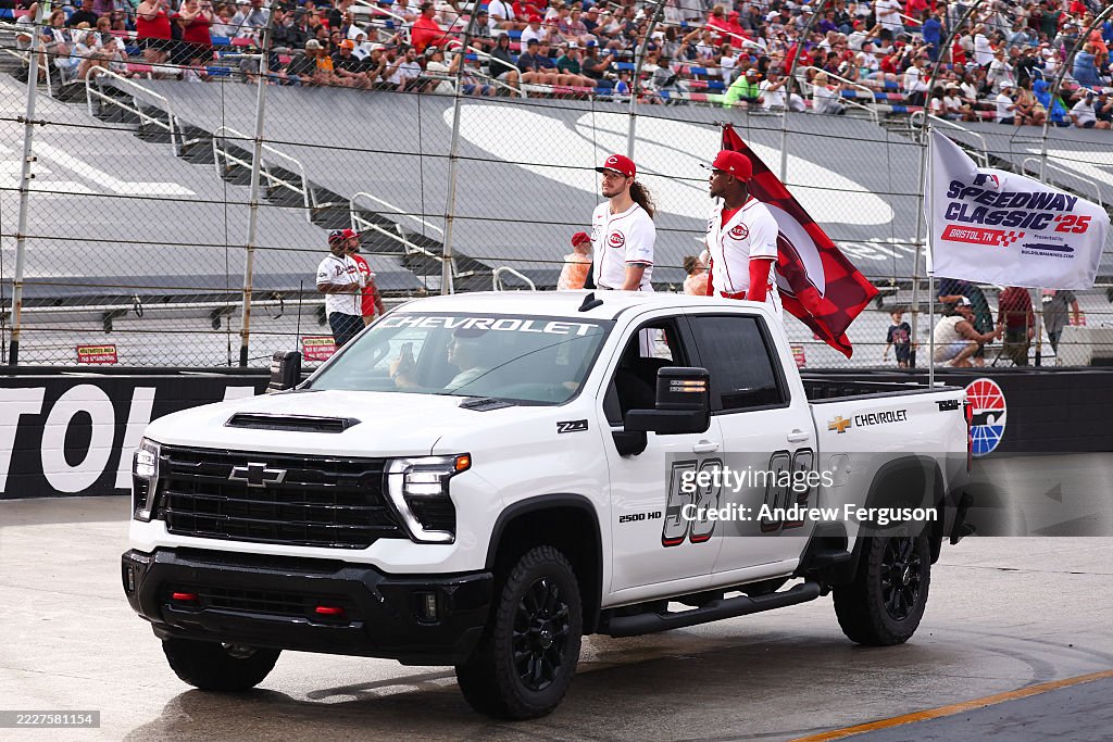 Brave Reds Racetrack Game Scott Barlow and Luis Mey of the Cincinnati Reds ride on the track to ...