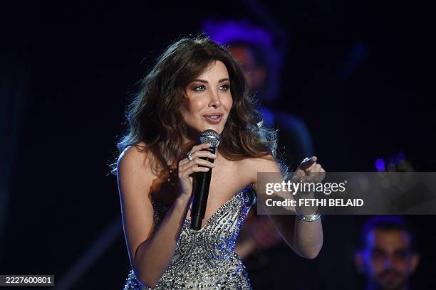 Lebanese singer Nancy Ajram performs during the 59th edition of the