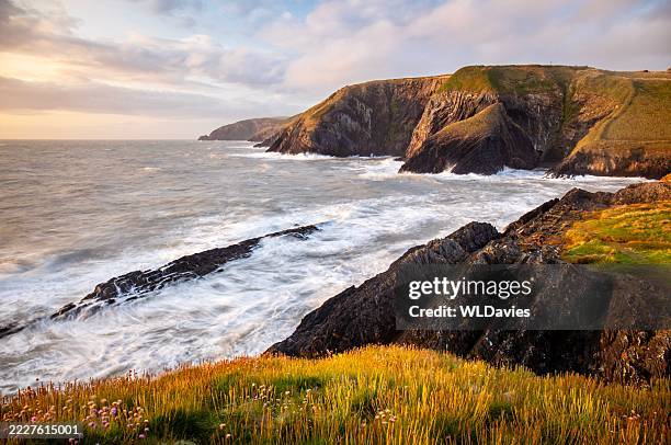 stormy pembrokeshire coastline - south wales stock pictures, royalty-free photos & images