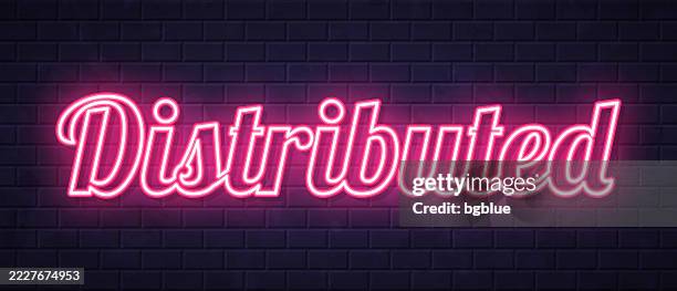 distributed - glowing neon text on brick wall background - ddos attack stock illustrations