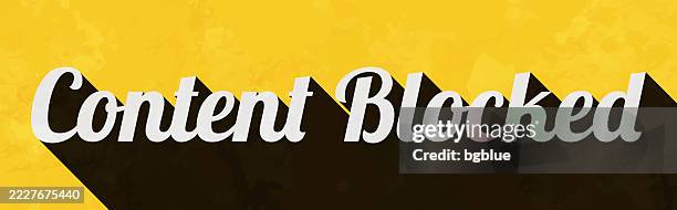 content blocked - text with long shadow on textured yellow background - creative content stock illustrations