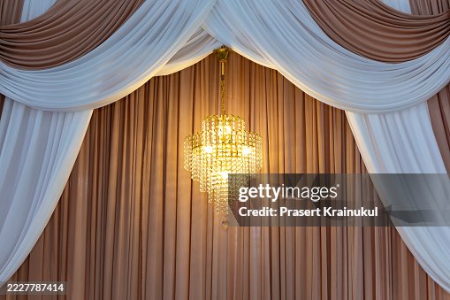 Curtain background agains chandelier Curtain background agains chandelier