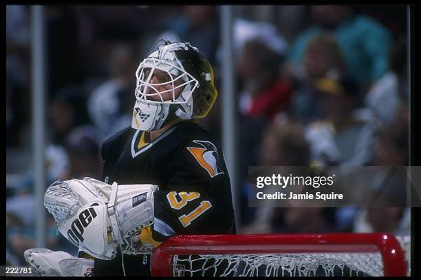 Goaltender Ken Wregget of the Pittsburgh Penguins looks on during a game against the Anaheim Mighty Ducks at Arrowhead Pond in Anaheim, California....