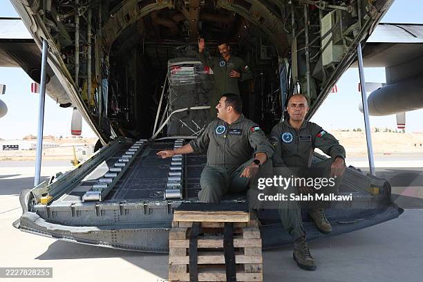Jordanian C-130 military aircraft is being prepared at the King Abdullah II air base for an aid air drop over the Gaza Strip on July 31, 2025 in...