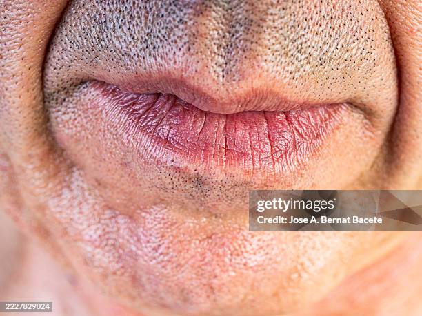 lips and mouth of a 60-year-old caucasian male. - labial palp stock pictures, royalty-free photos & images