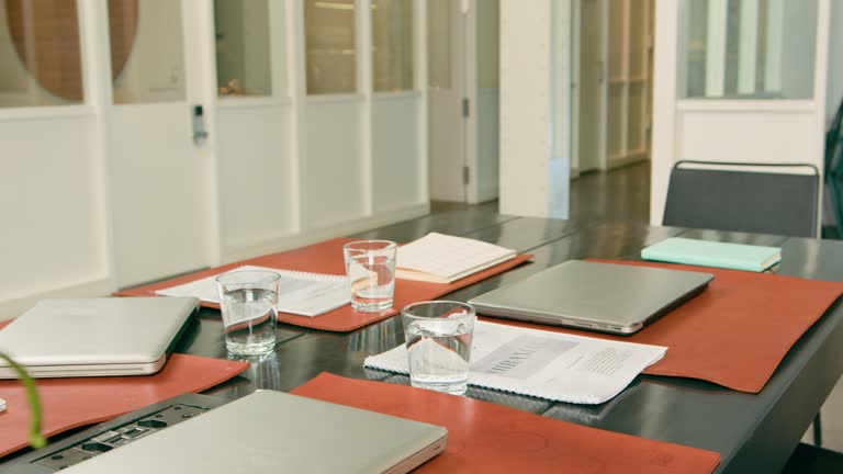 https://media.gettyimages.com/id/2227838820/video/empty-modern-corporate-boardroom-ready-for-a-productive-business-meeting-with-laptops-papers.jpg?b=1&s=640x640&k=20&c=xhuXx_TgP09dt1IjnF268n1uZ7pXQrbtU3lu6FxhsTk=