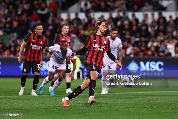 Comotto Christian Comotto of AC Milan scores his goal from the penalty spot ...