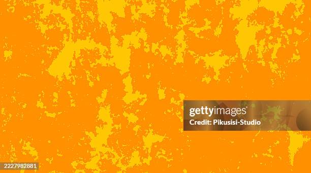 grunge wall texture with patina effect in vibrant orange and yellow - patina stock illustrations