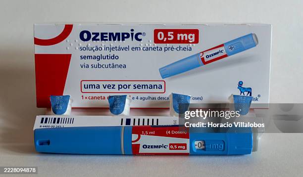 Ozempic 0.5 mg pen, needles and box printed in Portuguese are... News Photo