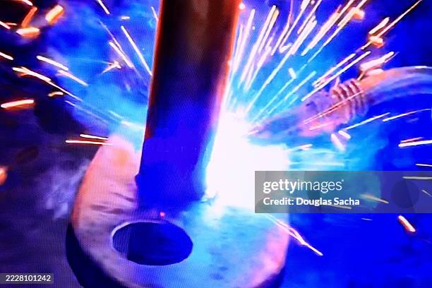 flame and sparks from a metal cutting torch - automatic welding torch stock pictures, royalty-free photos & images