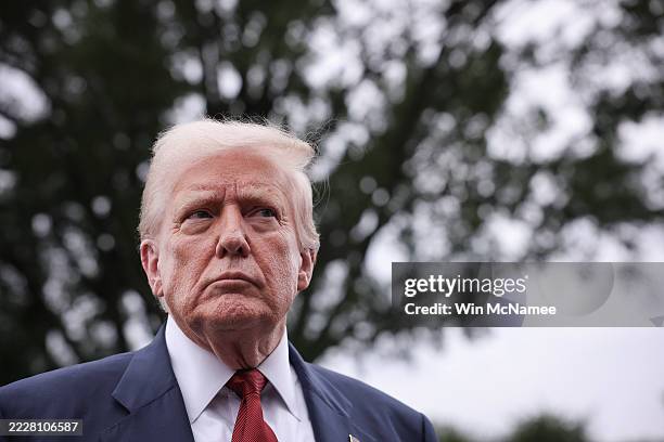 President Donald Trump speaks to the media as he departs the White House on August 01, 2025 in Washington, DC. Trump answered a range of questions...