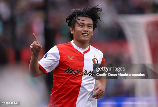 Ayase Ueda of Feyenoord celebrates scoring his team's first goal during the pre-season friendly match between Feyenoord and VfL Wolfsburg at Phillips...