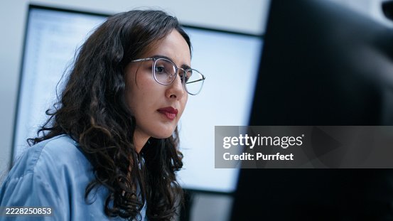 Female Software Developer, Programmer Working on Code Software Project, artificial intelligence and programming in Tech Office Female Software Developer, Programmer Working on Code Software Project, artificial intelligence and programming in Tech Office