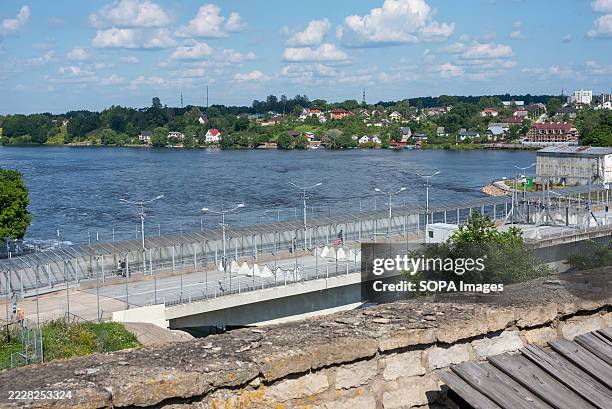 People seen crossing the border back to Russia on the Friendship Bridge. Narva is a city located on the easternmost edge of Estonia, bordering...