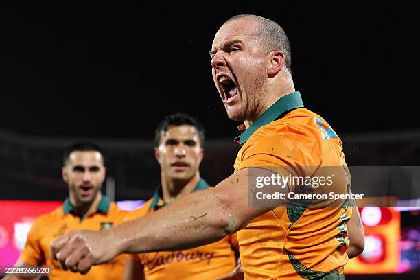 Dylan Pietsch of the Wallabies celebrates scoring a try during the third test of the series between Australia Wallabies and British & Irish Lions at...