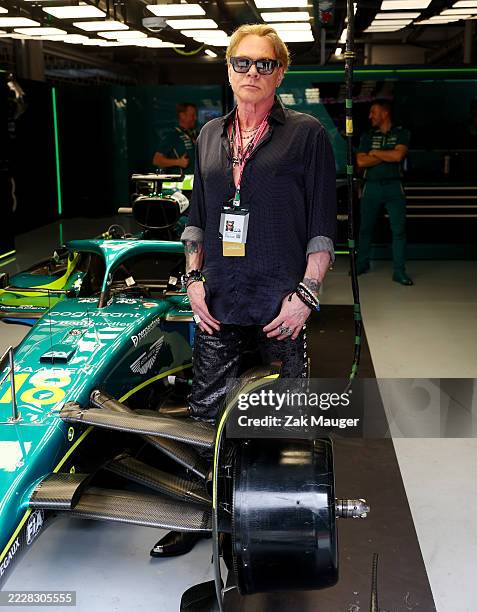 Axl Rose visits the Aston Martin F1 Team garage prior to the F1 Grand Prix of Hungary at Hungaroring on August 03, 2025 in Budapest, Hungary.