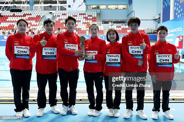 Members of Team China pose with the Best Diving Team trophy on day 24 of the Singapore 2025 World Aquatics Championships at OCBC Aquatic Centre on...