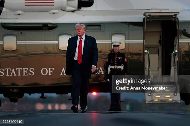 President Donald Trump walks towards reporters from Marine One at at the Lehigh Valley International Airport on August 03, 2025 in Allentown,...