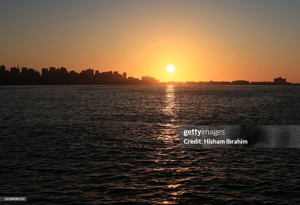 Alexandria Skyline, El Corniche, and the Coastline at Sunset - Alexandria, Egypt.