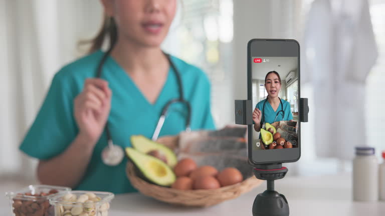 https://media.gettyimages.com/id/2228441397/video/dietitian-doctor-medical-health-care-influencer-live-tele-consult-telehealth-on-social-media.jpg?b=1&s=640x640&k=20&c=T7SuXQZq0ok3Y6NOeKGFaShP04GvB41Lsa17A_NlBcM=