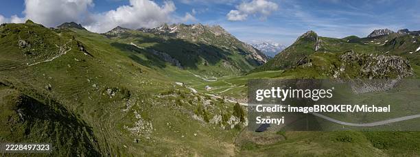 cormet d'areche with pass summit and small lake, connection from beaufort to aime in the tarentaise, drone shot, savoy, france - mountain pass stock pictures, royalty-free photos & images