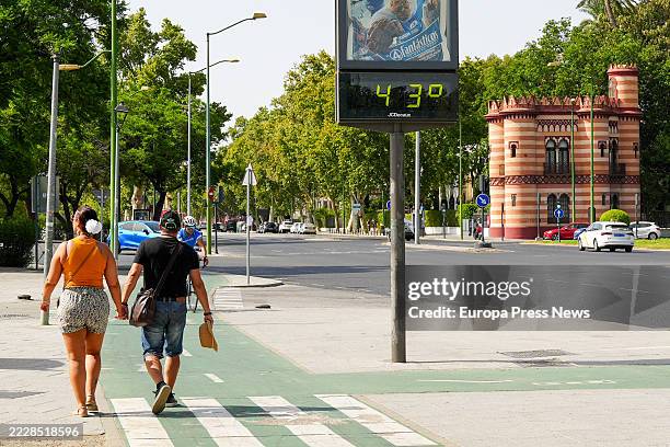 Pedestrians in the Andalusian capital in the heat wave. August 4, 2025 in Seville, Andalusia, Spain. The city of Seville is experiencing a strong...