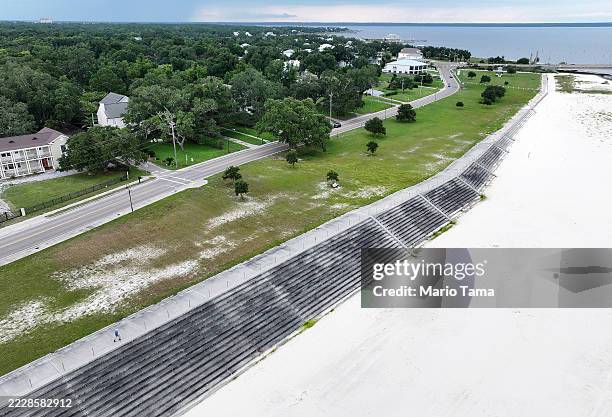An aerial view of a stepped seawall completed by the U.S. Army Corps of Engineers in 2012 to protect against storm surges on August 04, 2025 in Bay...