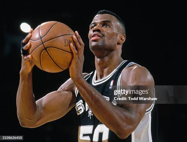David Robinson, Center for the San Antonio Spurs prepares to shoot a free throw during the NBA Pacific Division basketball game against the Los...