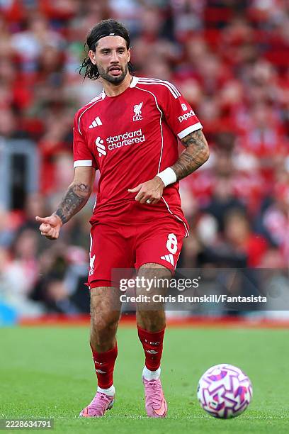 Dominik Szoboszlai of Liverpool in action during the pre-season friendly match between Liverpool v Athletic Club Bilbao at Anfield on August 04, 2025...