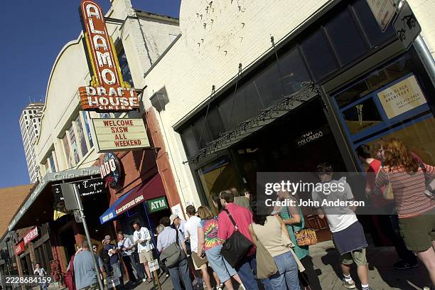 View of people in line, during South By Southwest film festival, outside the Alamo Drafthouse Cinema , Austin, Texas, March 12, 2005. The cinema's...