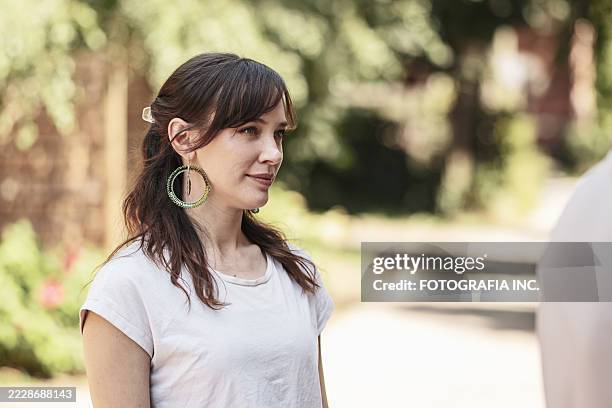 close up of young woman creating mural - hamilton ontario stock pictures, royalty-free photos & images