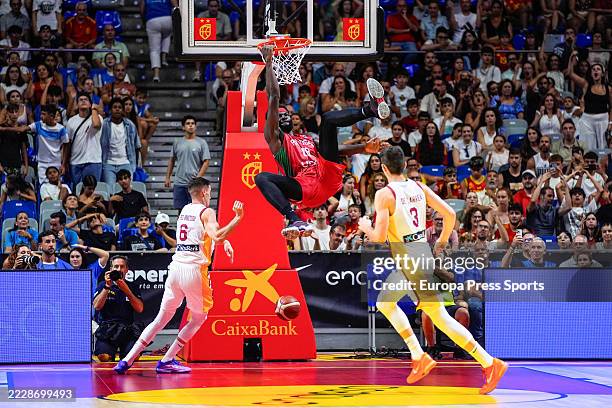 Neemias Queta of Portugal dunks the ball during the City of Malaga basketball tournament match between Spain and Portugal at Jose Maria Martin...
