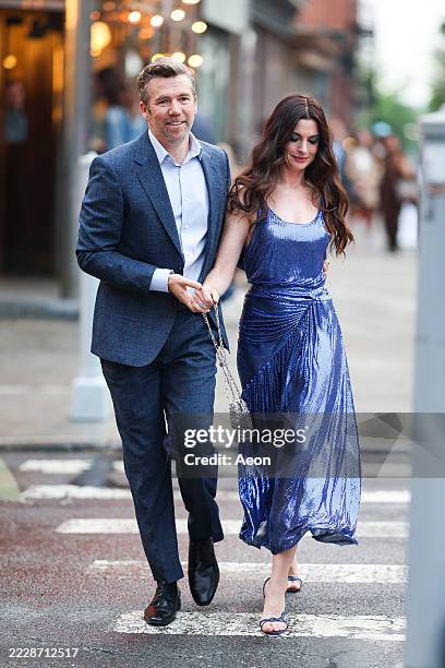 Patrick Brammall and Anne Hathaway seen on the set of "The Devil Wears Prada 2" in Brooklyn on August 05, 2025 in New York City.