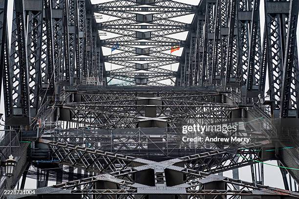 sydney harbour bridge metal girder structure pattern inside - sydney harbour bridge aboriginal flag stock pictures, royalty-free photos & images