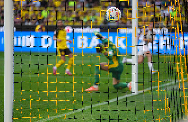 Andrea Cambiaso scores and celebrates his teams second goal during the preseason friendly match between Borussia Dortmund and Juventus at Signal Luna...
