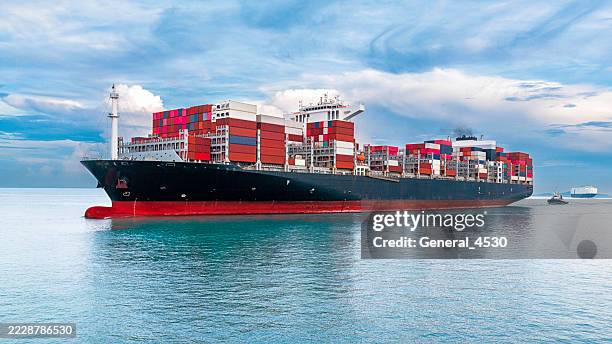 aerial view container cargo ship full carrier container form terminal commercial port on the sea. - container ship front stock pictures, royalty-free photos & images