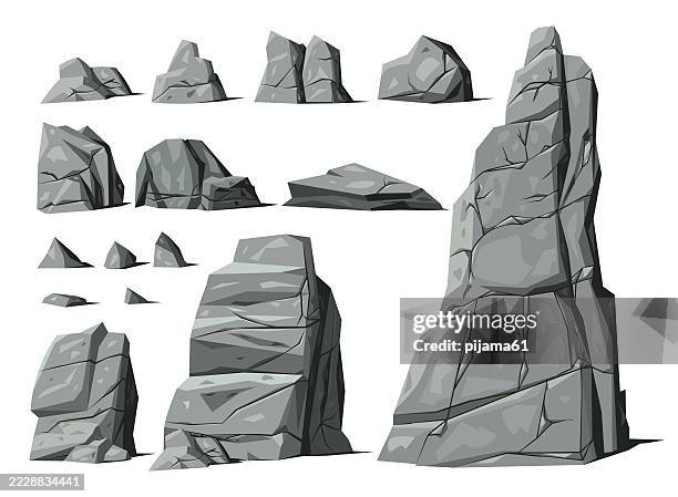vector illustration set of rocks and stones grey colors. cartoon stone and elements for game in flat style. - pile of rocks stock illustrations