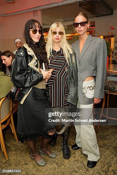 Livia Schück, Josephine Bergqvist and Hilda Sandstrom attend the Dazed and Ray-Ban Copenhagen Fashion Week dinner at Bar Amore on August 06, 2025 in...